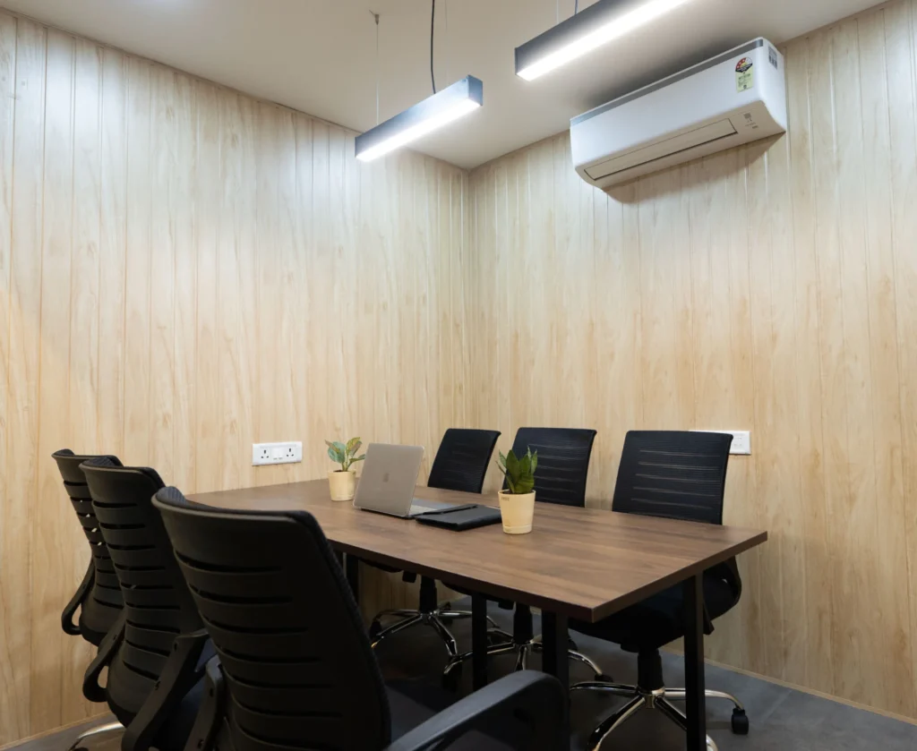 Meeting room with table, chairs and air conditioning at Linked Offices, Kolkata